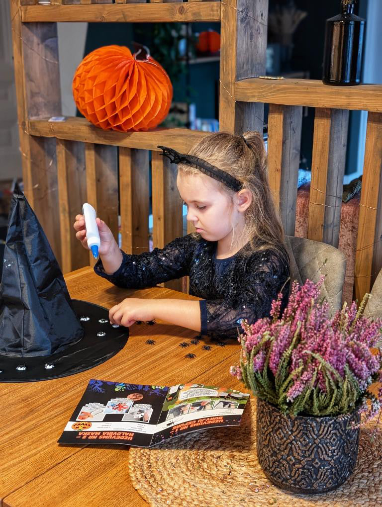 Bērns aplīmē cepuri